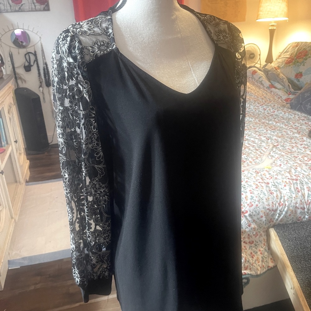 Black top with sheer sleeves size L